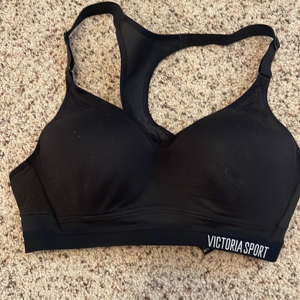 Victoria’s Secret incredible sports bra with built in cups size 34C. Gently used